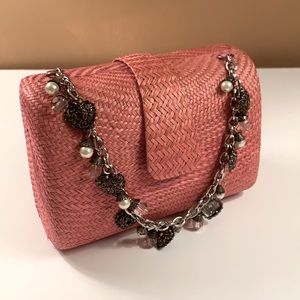 Donna Dixon pink wicker handbag